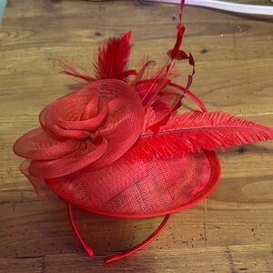 Elegant Red Fascinator with Feathers